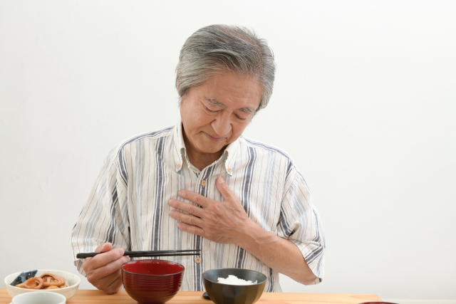 胸焼けの男性